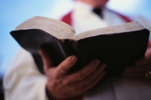 Pastor Holding Bible